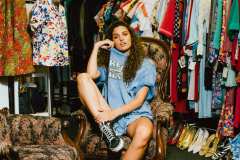 Andrea, wearing a distressed 90's Harley Davidson t-shirt.